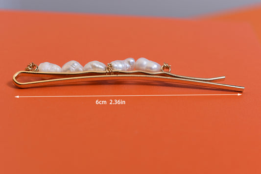 Three sets of natural pearl gold hair clips