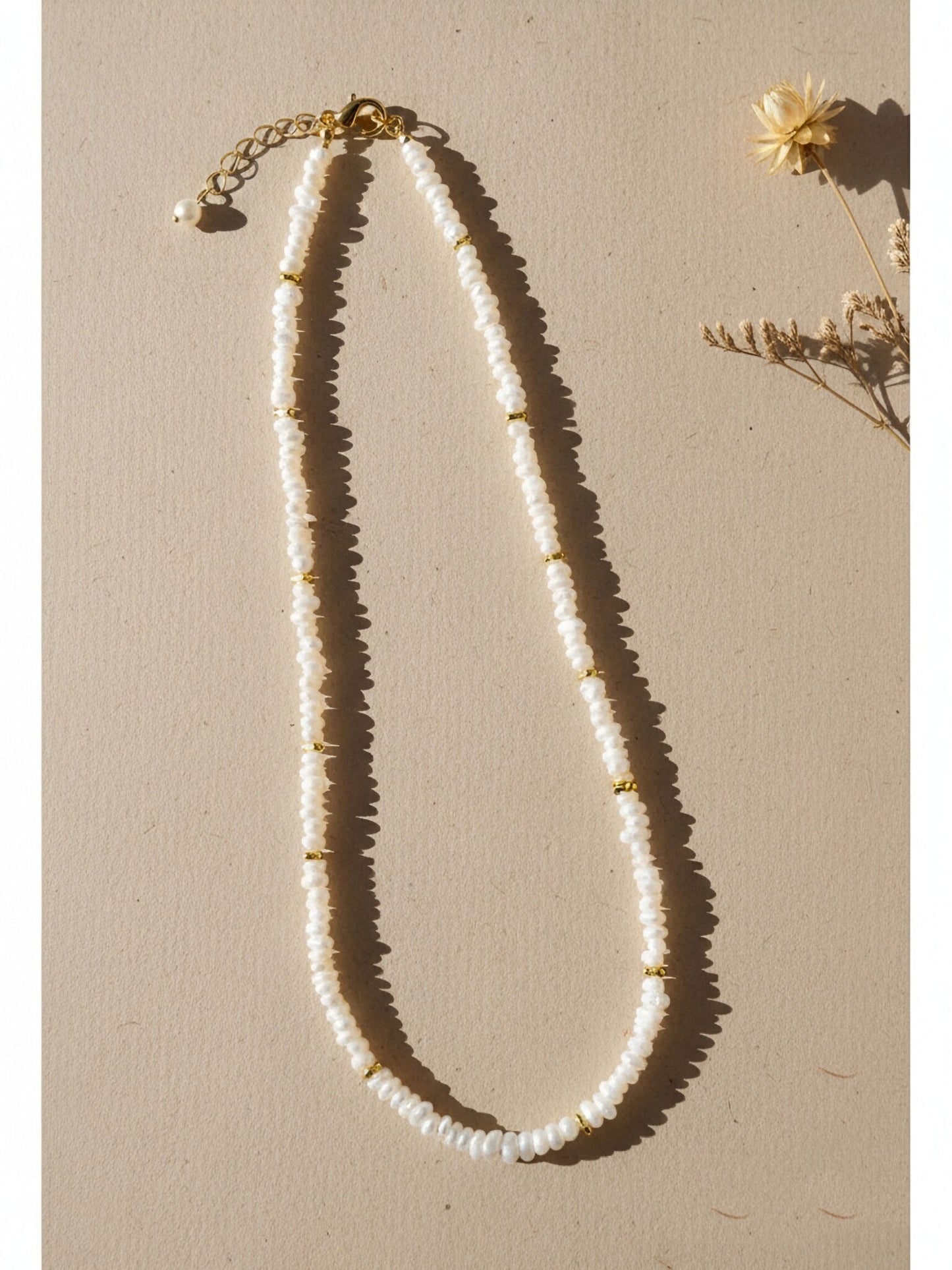 Natural pearl necklace with rice shaped pearl strap and adjustable chain length
