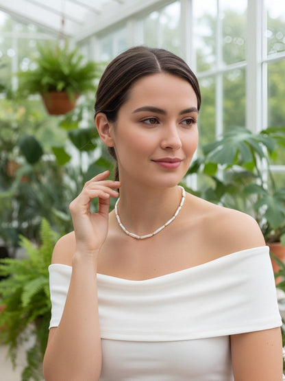 Natural pearl necklace with small silver bar shaped pearl strap and adjustable chain length