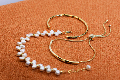 Natural pearl bracelet three piece set paired with smile bracelet and gold open hammer bracelet