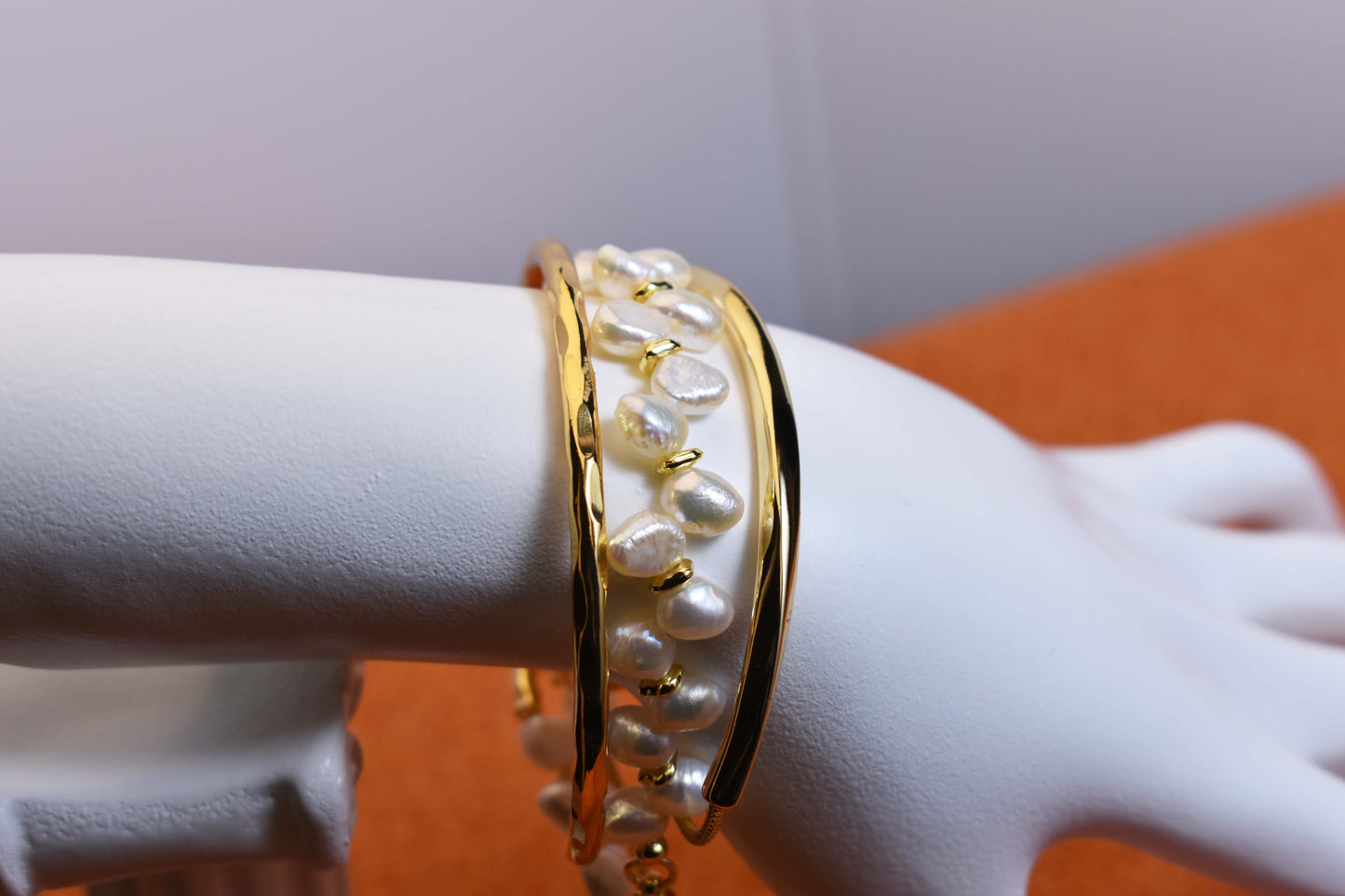 Natural pearl bracelet three piece set paired with smile bracelet and gold open hammer bracelet