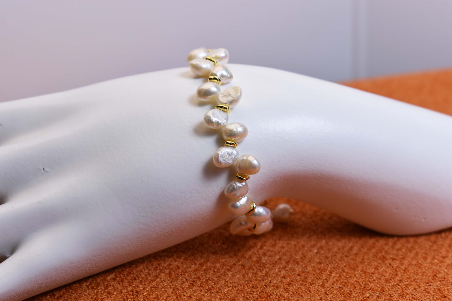 Natural pearl bracelet three piece set paired with smile bracelet and gold open hammer bracelet