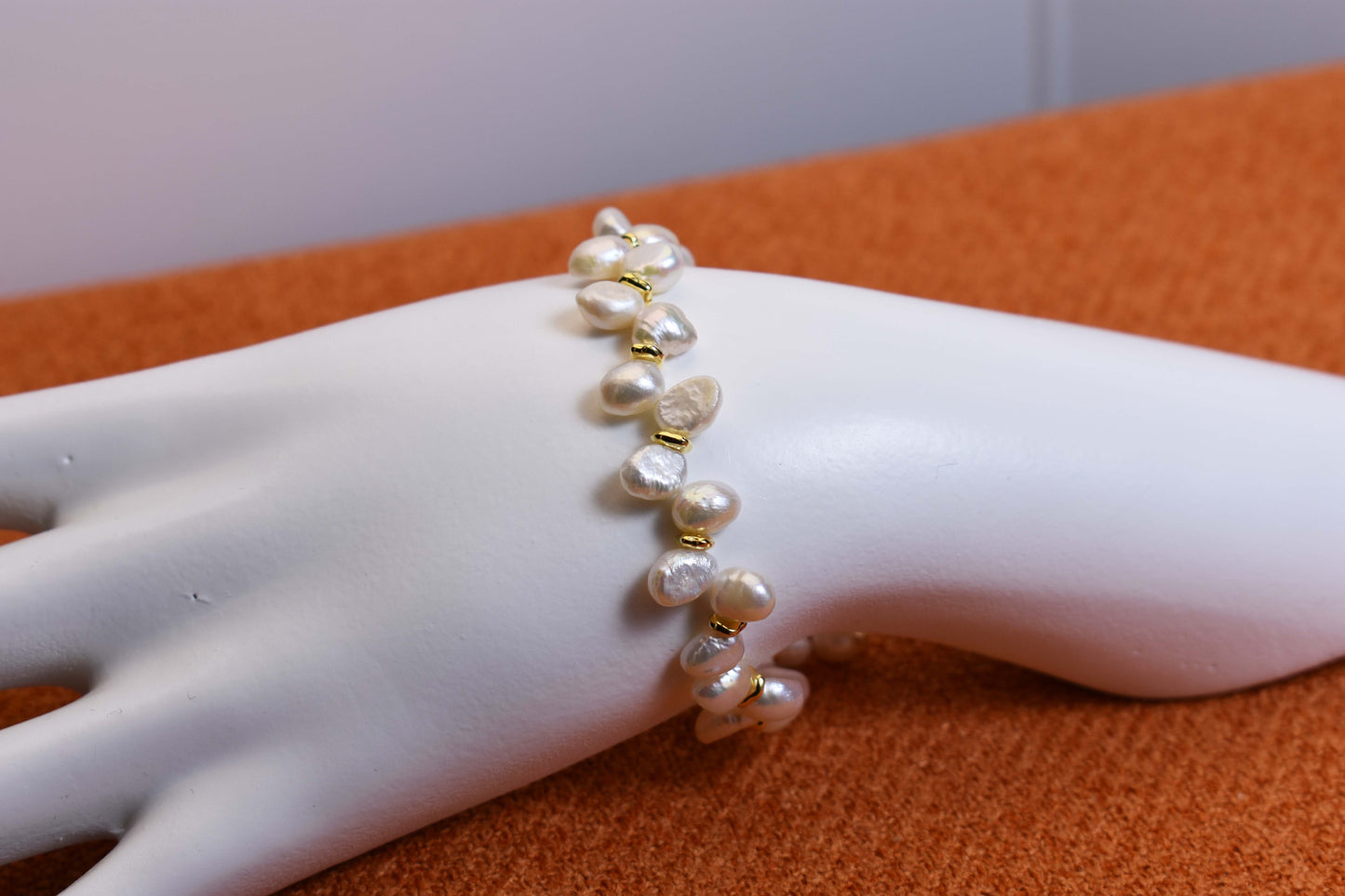 Natural pearl bracelet three piece set paired with smile bracelet and gold open hammer bracelet