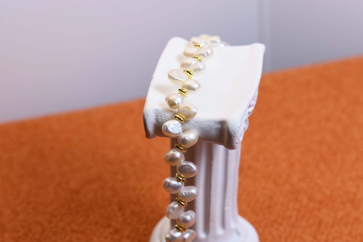 Natural pearl bracelet three piece set paired with smile bracelet and gold open hammer bracelet