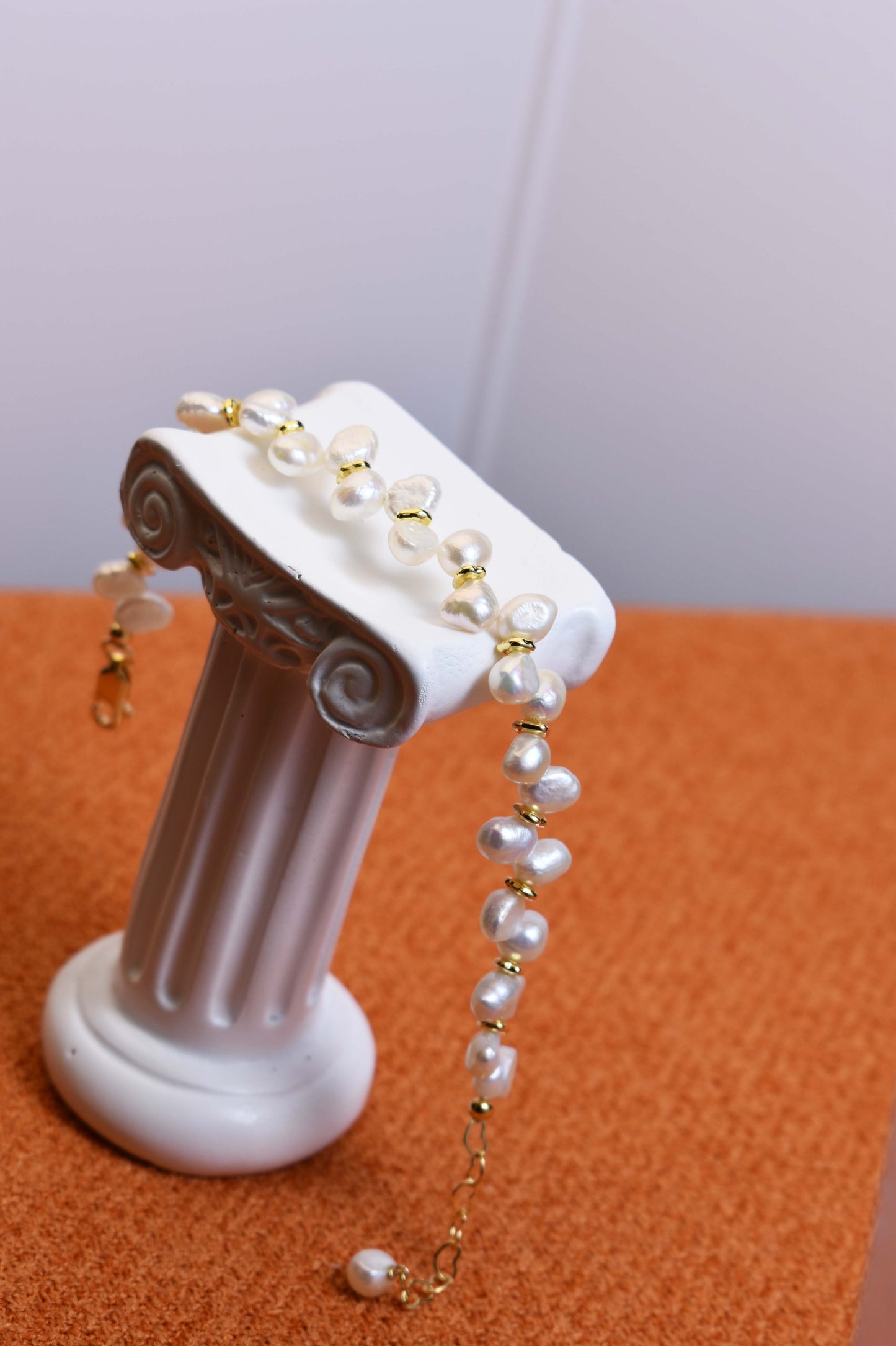 Natural pearl bracelet three piece set paired with smile bracelet and gold open hammer bracelet