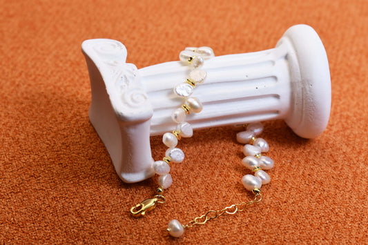 Natural pearl bracelet three piece set paired with smile bracelet and gold open hammer bracelet