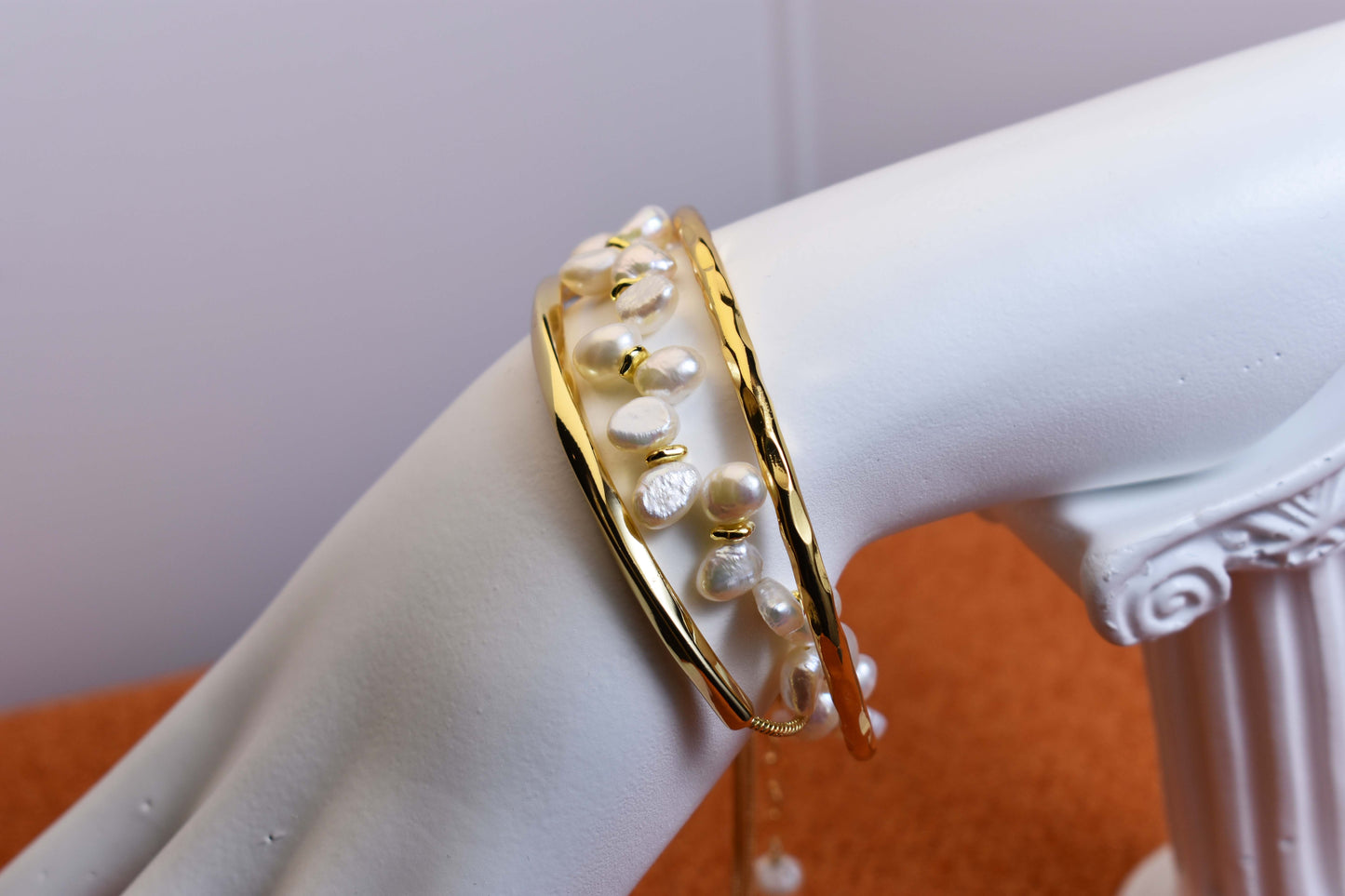 Natural pearl bracelet three piece set paired with smile bracelet and gold open hammer bracelet