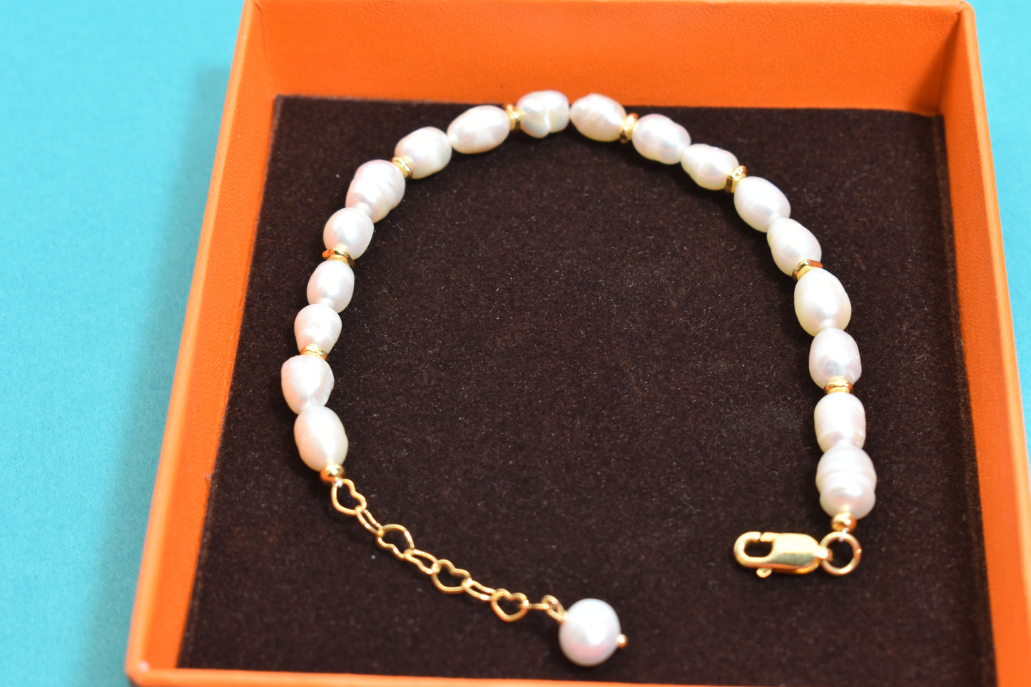 Natural pearl bracelet three piece set paired with  smile bracelet and gold open hammer bracelet