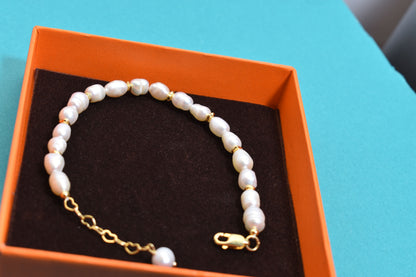 Natural pearl bracelet three piece set paired with  smile bracelet and gold open hammer bracelet