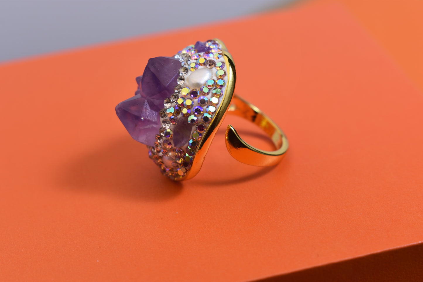 Luxurious and shiny natural amethyst pearl ring with three-dimensional dense inlay of tourmaline and colored zircon. Adjustable ring at the opening