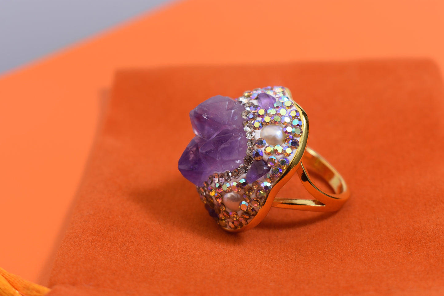 Luxurious and shiny natural amethyst pearl ring with three-dimensional dense inlay of tourmaline and colored zircon. Adjustable ring at the opening
