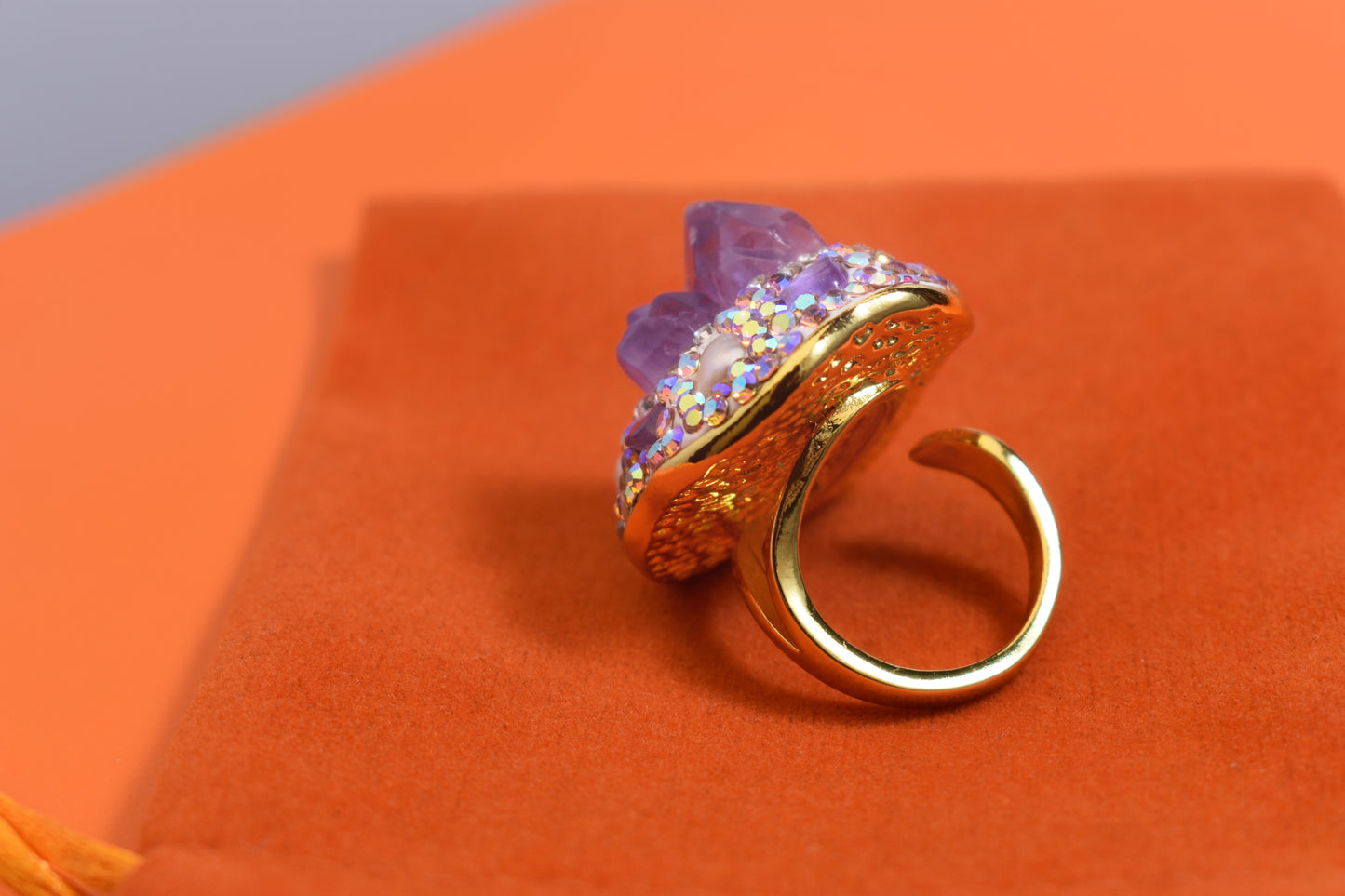 Luxurious and shiny natural amethyst pearl ring with three-dimensional dense inlay of tourmaline and colored zircon. Adjustable ring at the opening