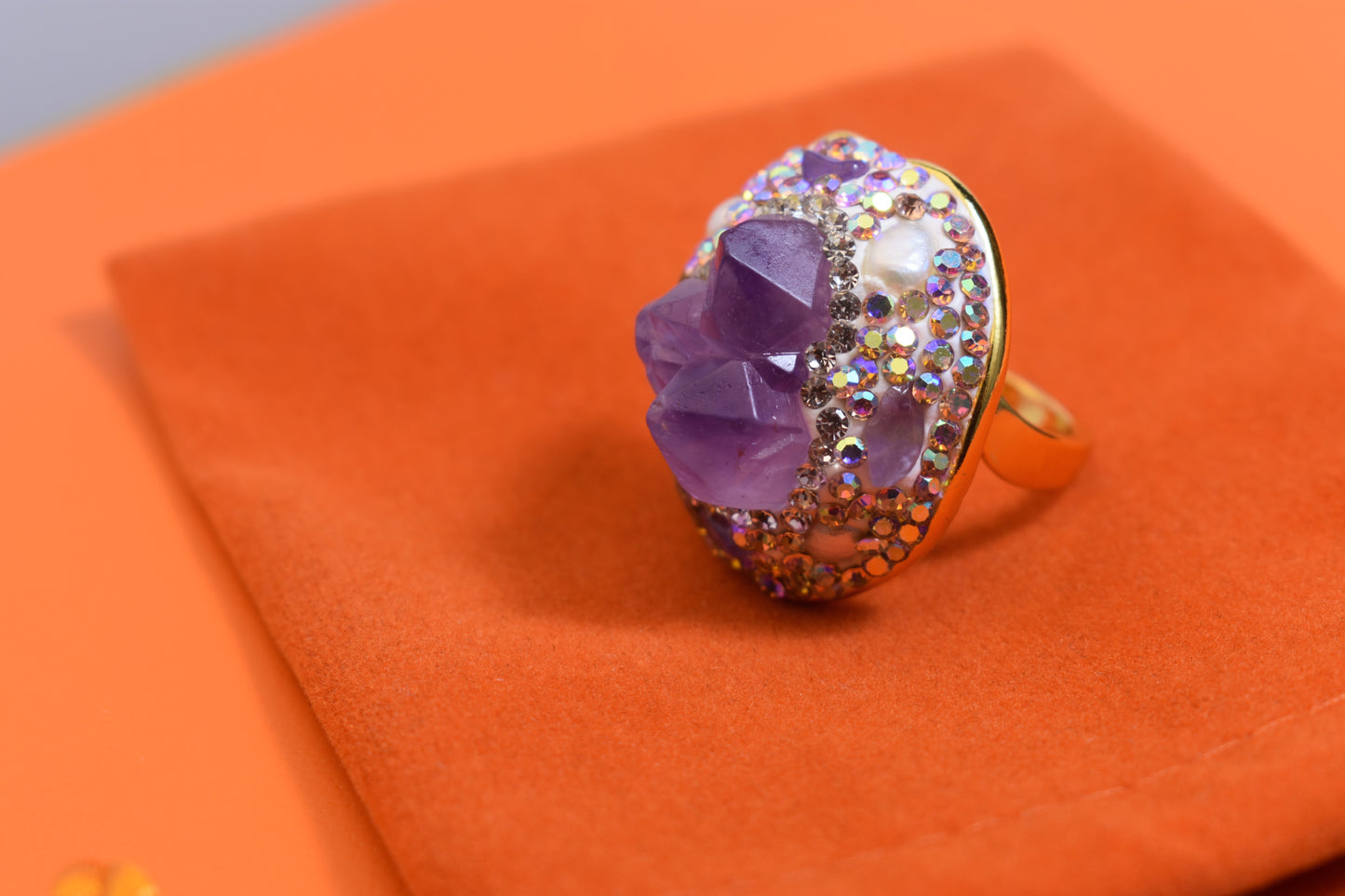 Luxurious and shiny natural amethyst pearl ring with three-dimensional dense inlay of tourmaline and colored zircon. Adjustable ring at the opening