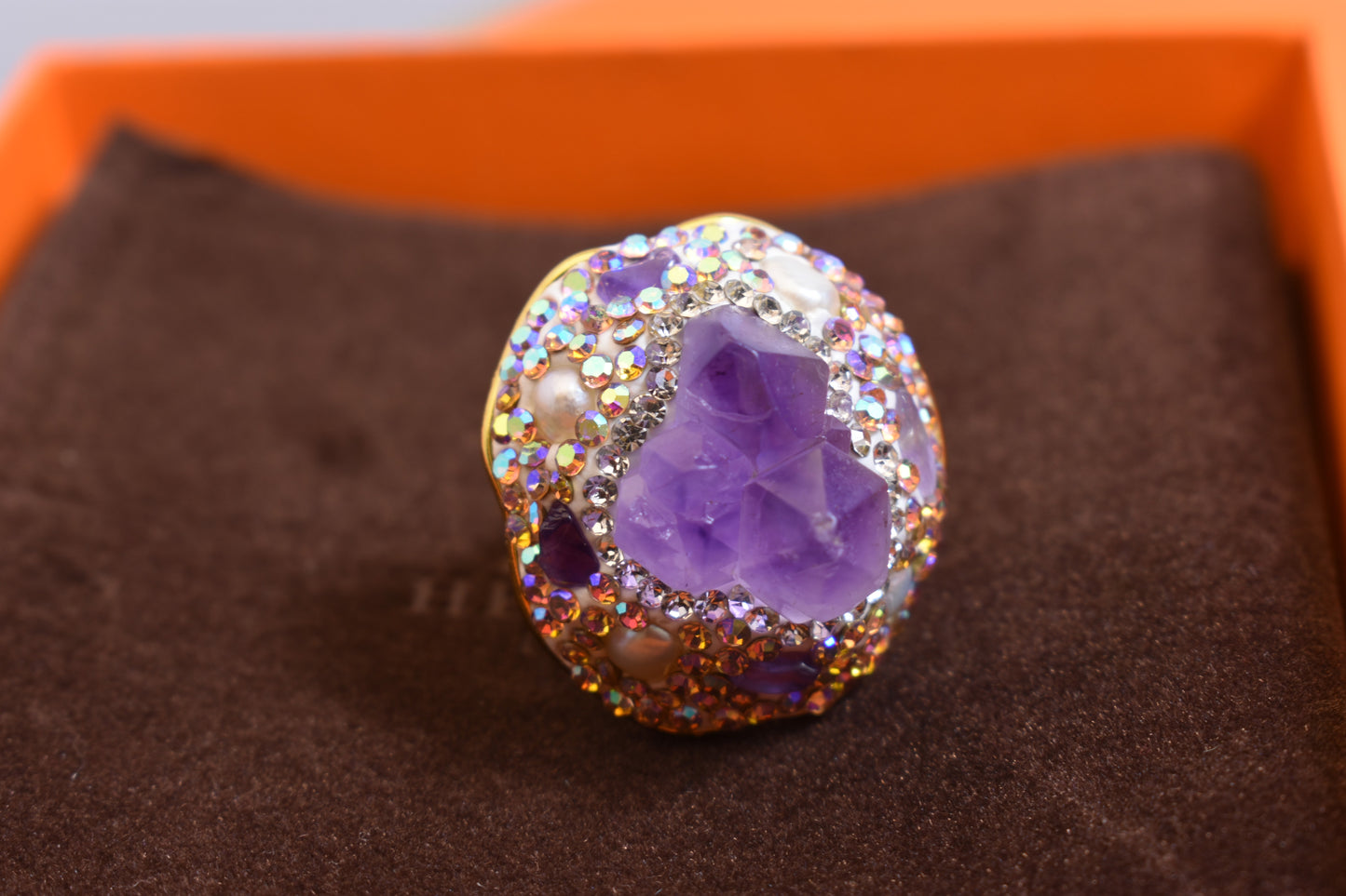 Luxurious and shiny natural amethyst pearl ring with three-dimensional dense inlay of tourmaline and colored zircon. Adjustable ring at the opening
