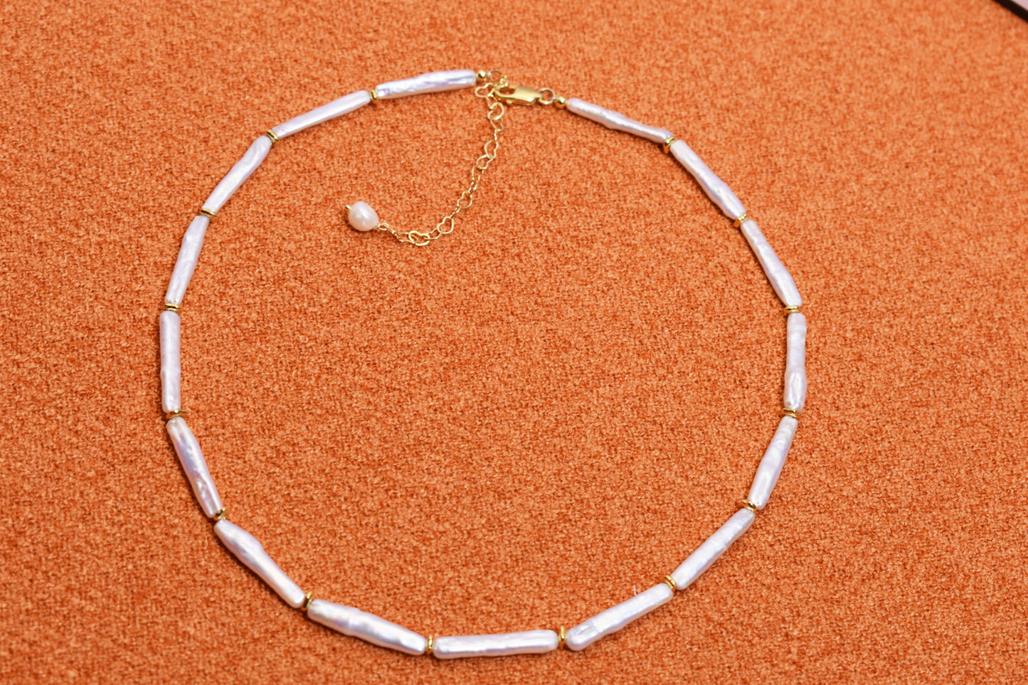 Natural pearl necklace with small silver bar shaped pearl strap and adjustable chain length