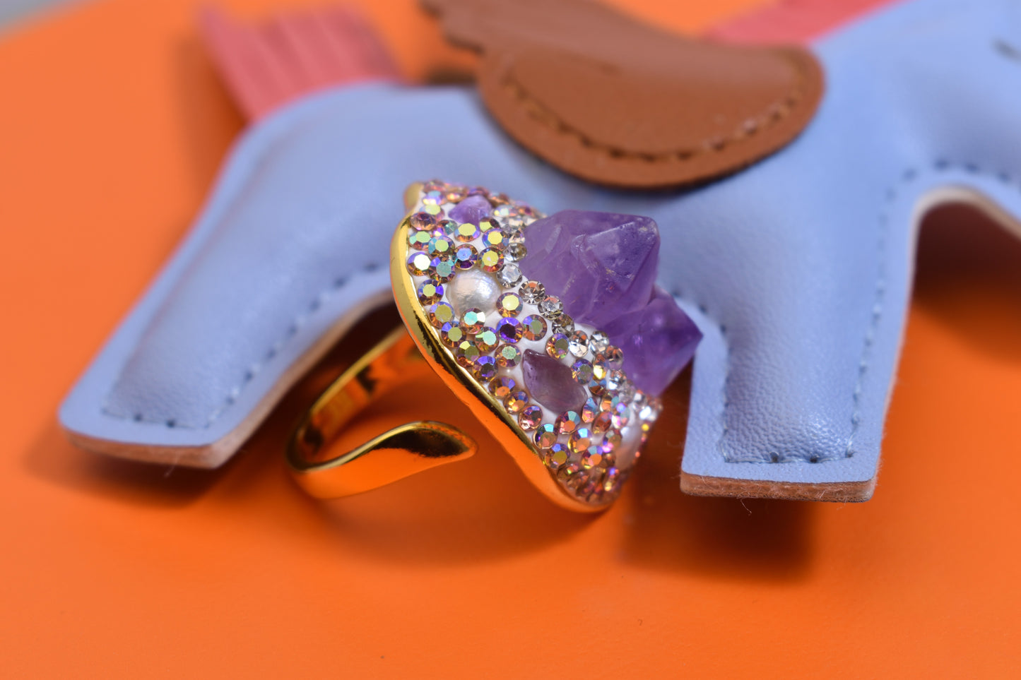 Luxurious and shiny natural amethyst pearl ring with three-dimensional dense inlay of tourmaline and colored zircon. Adjustable ring at the opening