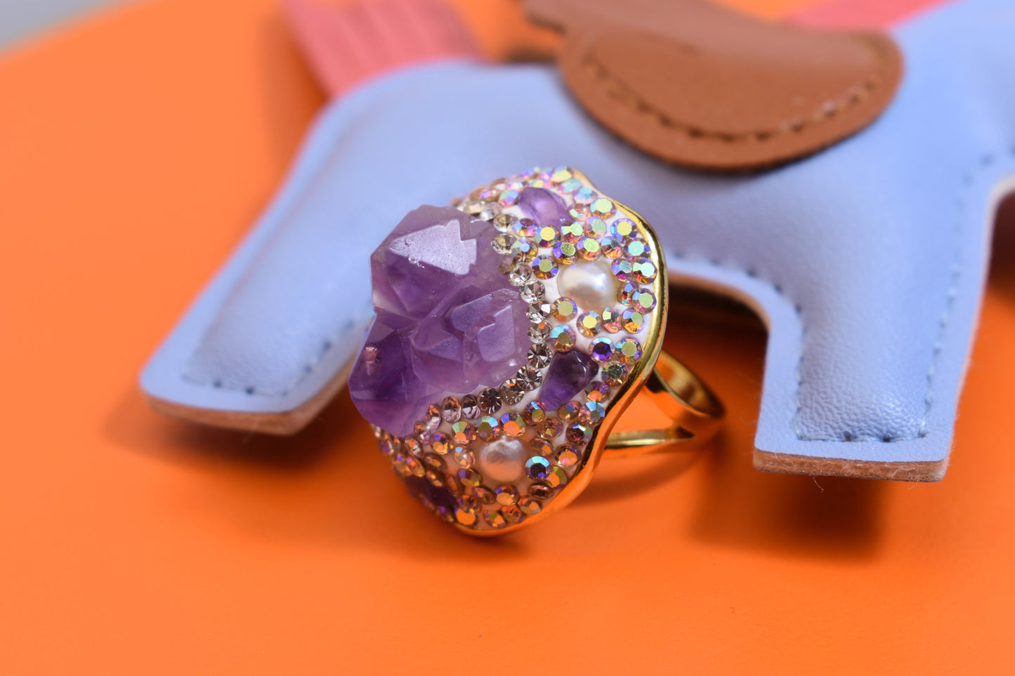 Luxurious and shiny natural amethyst pearl ring with three-dimensional dense inlay of tourmaline and colored zircon. Adjustable ring at the opening