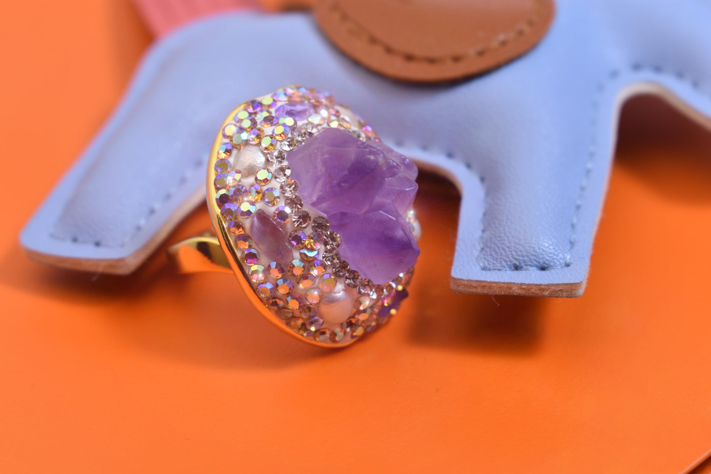 Luxurious and shiny natural amethyst pearl ring with three-dimensional dense inlay of tourmaline and colored zircon. Adjustable ring at the opening