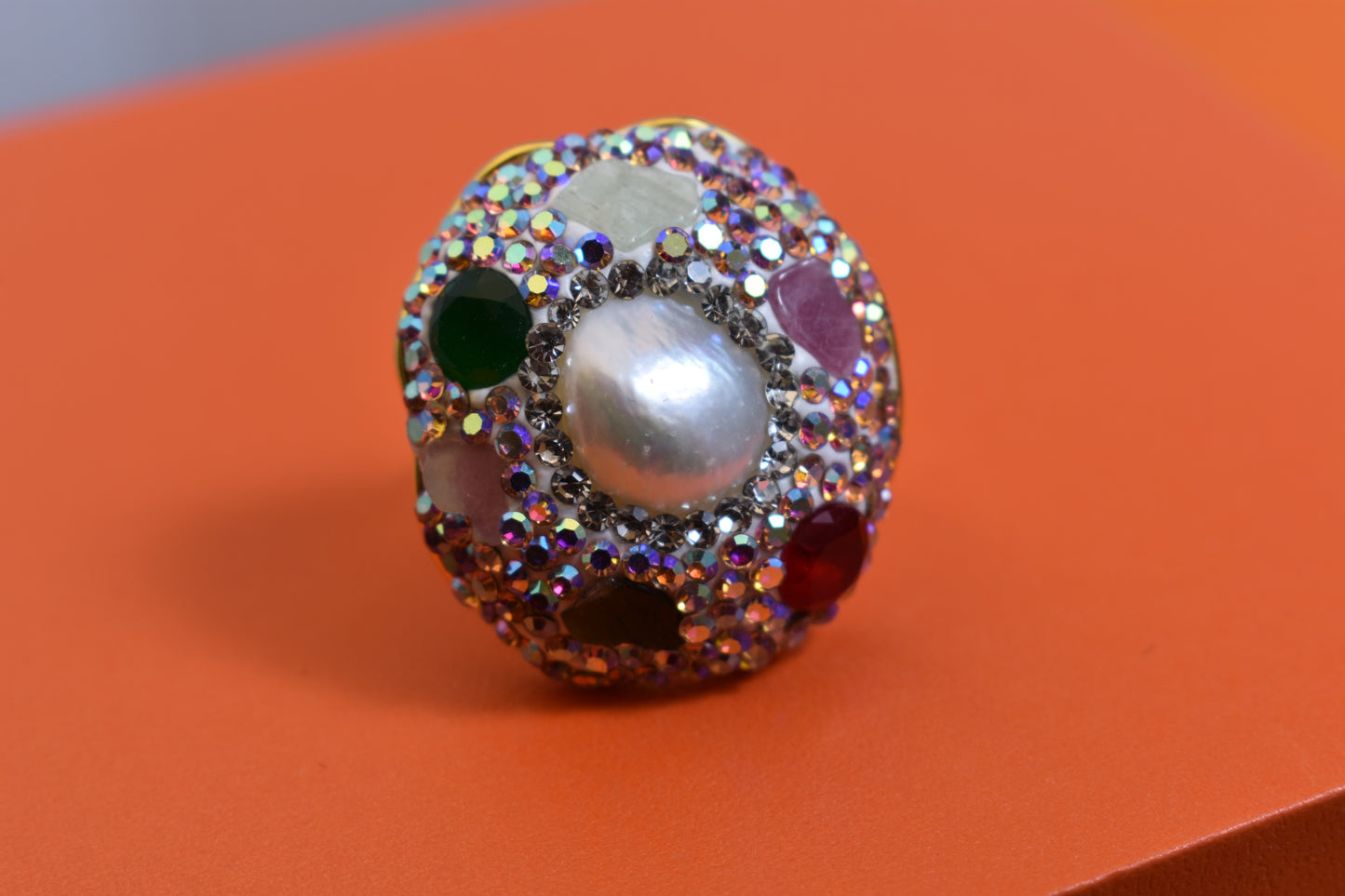 Luxurious shiny natural pearl ring with three-dimensional dense inlay of colored zircon gemstones, adjustable ring at the opening