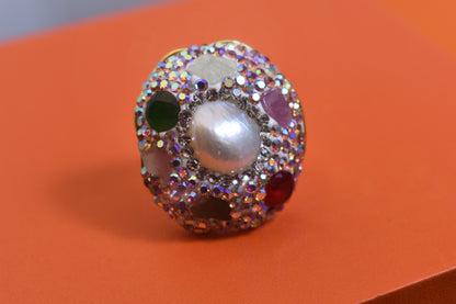 Luxurious shiny natural pearl ring with three-dimensional dense inlay of colored zircon gemstones, adjustable ring at the opening