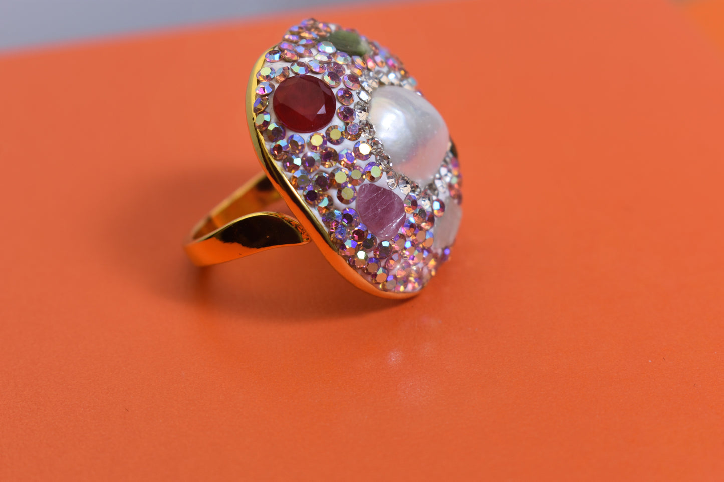 Luxurious shiny natural pearl ring with three-dimensional dense inlay of colored zircon gemstones, adjustable ring at the opening