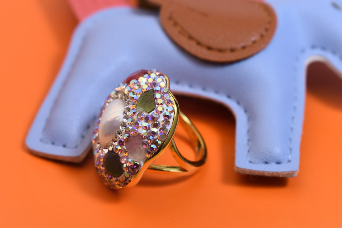 Luxurious shiny natural pearl ring with three-dimensional dense inlay of colored zircon gemstones, adjustable ring at the opening