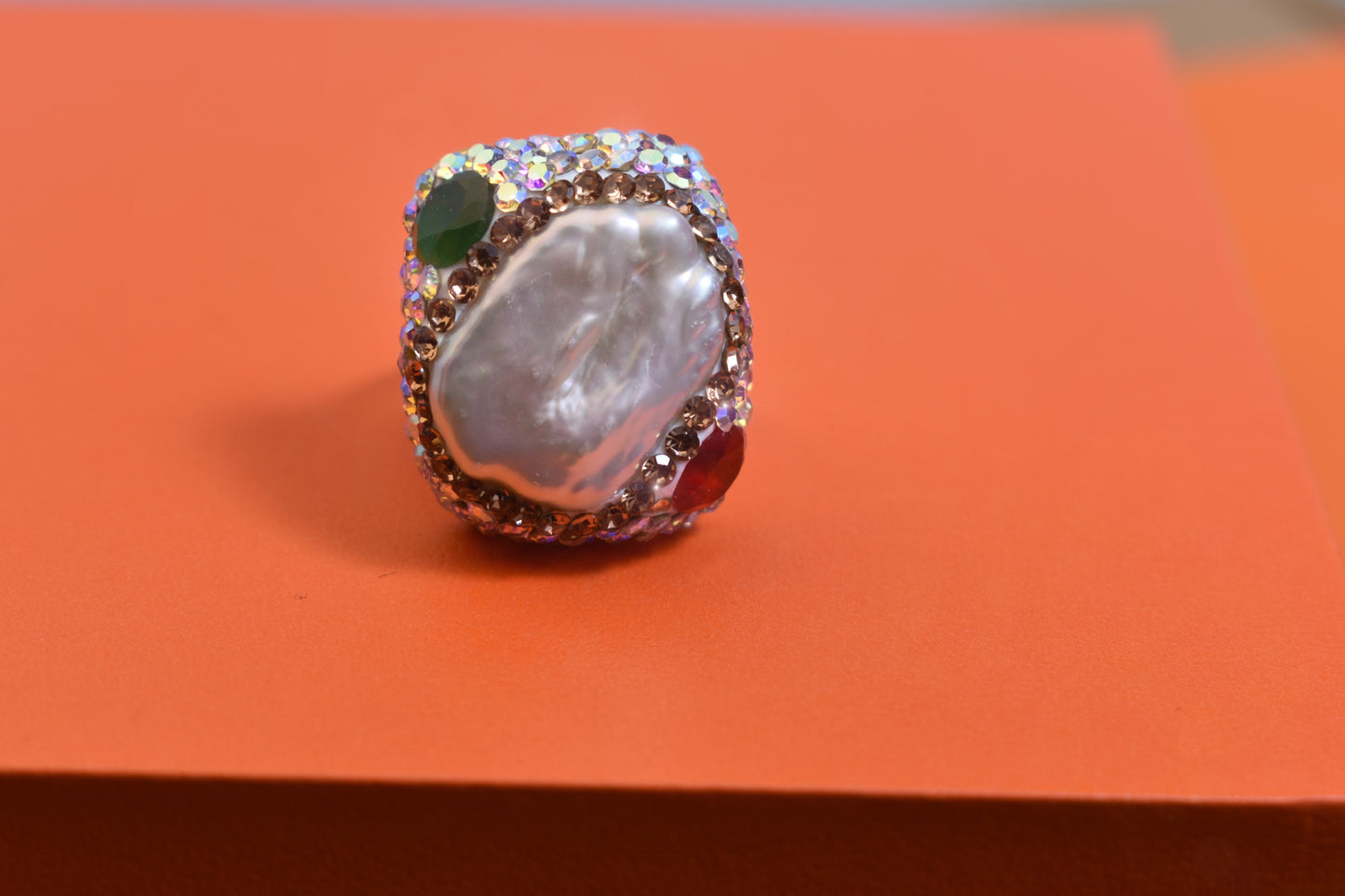 Luxurious shiny natural pearl ring with three-dimensional dense inlay of colored zircon gemstones, adjustable ring at the opening