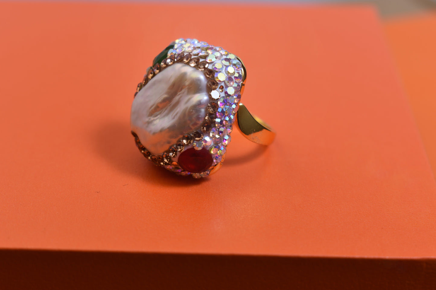 Luxurious shiny natural pearl ring with three-dimensional dense inlay of colored zircon gemstones, adjustable ring at the opening