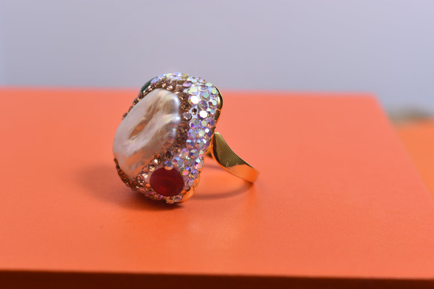 Luxurious shiny natural pearl ring with three-dimensional dense inlay of colored zircon gemstones, adjustable ring at the opening