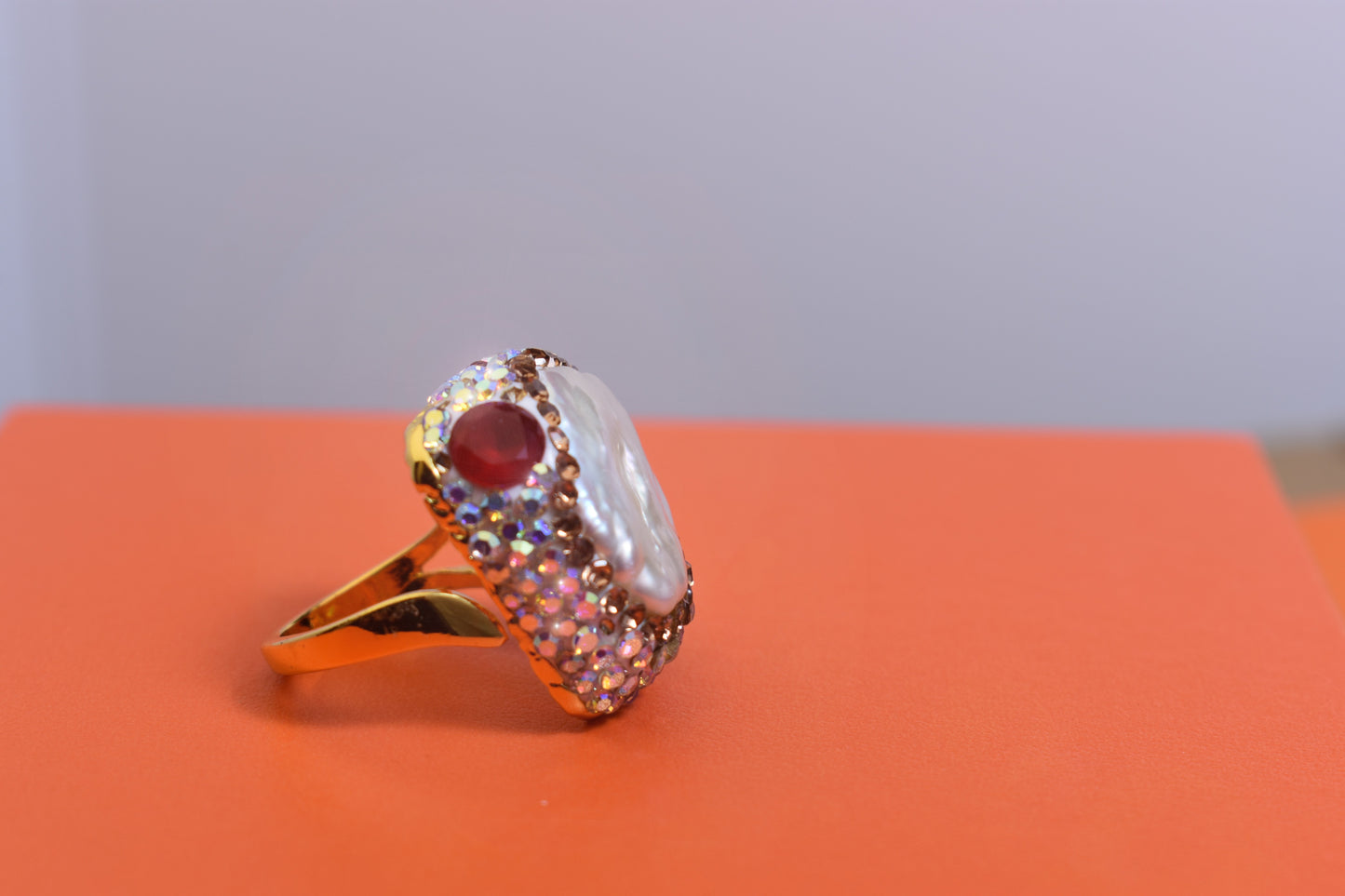 Luxurious shiny natural pearl ring with three-dimensional dense inlay of colored zircon gemstones, adjustable ring at the opening