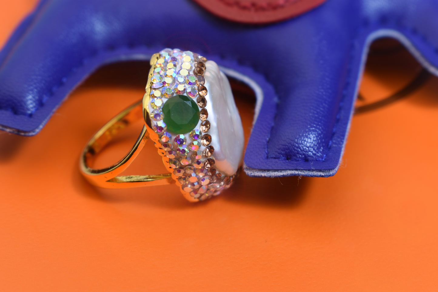 Luxurious shiny natural pearl ring with three-dimensional dense inlay of colored zircon gemstones, adjustable ring at the opening