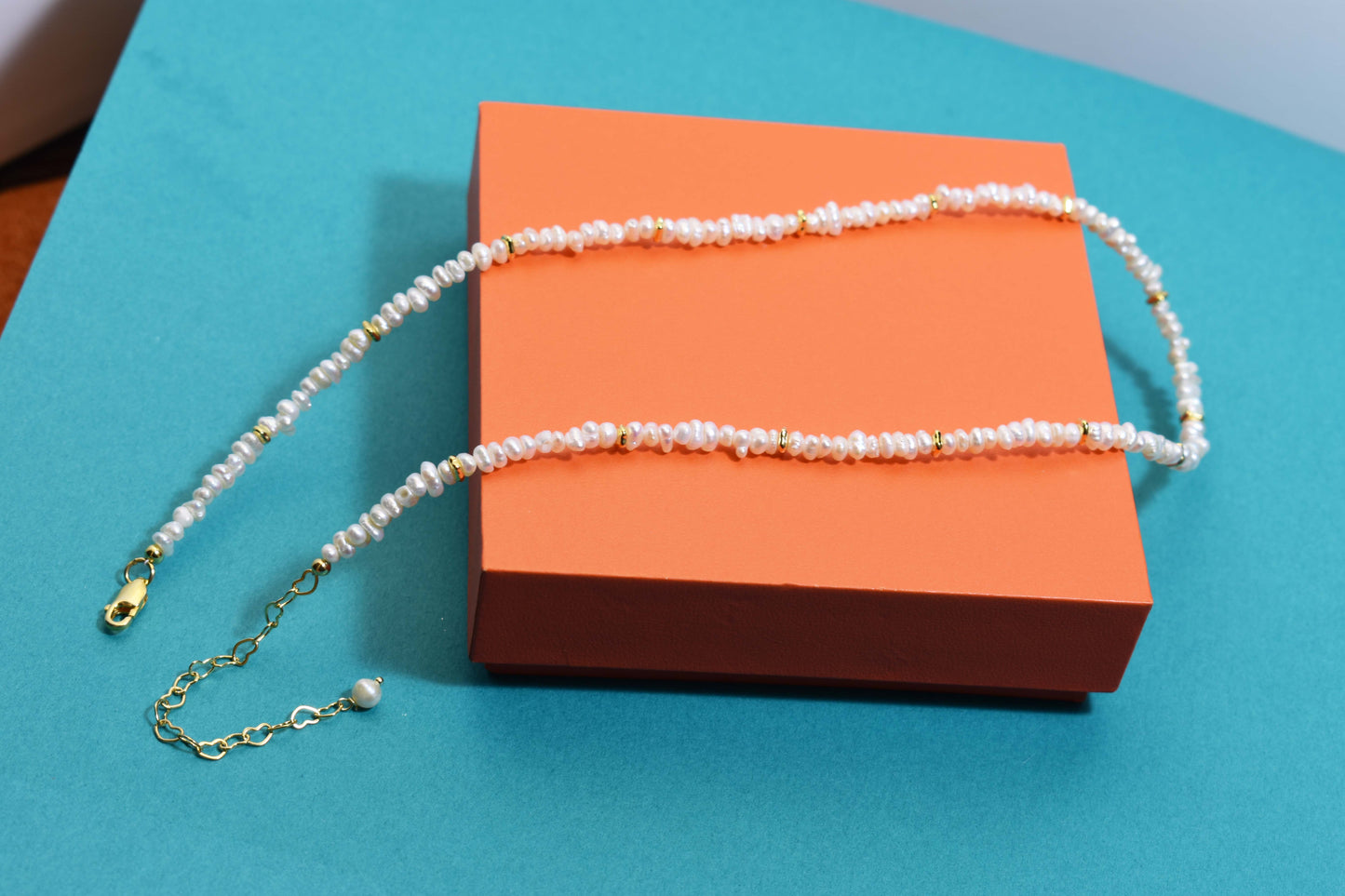 Natural pearl necklace with rice shaped pearl strap and adjustable chain length