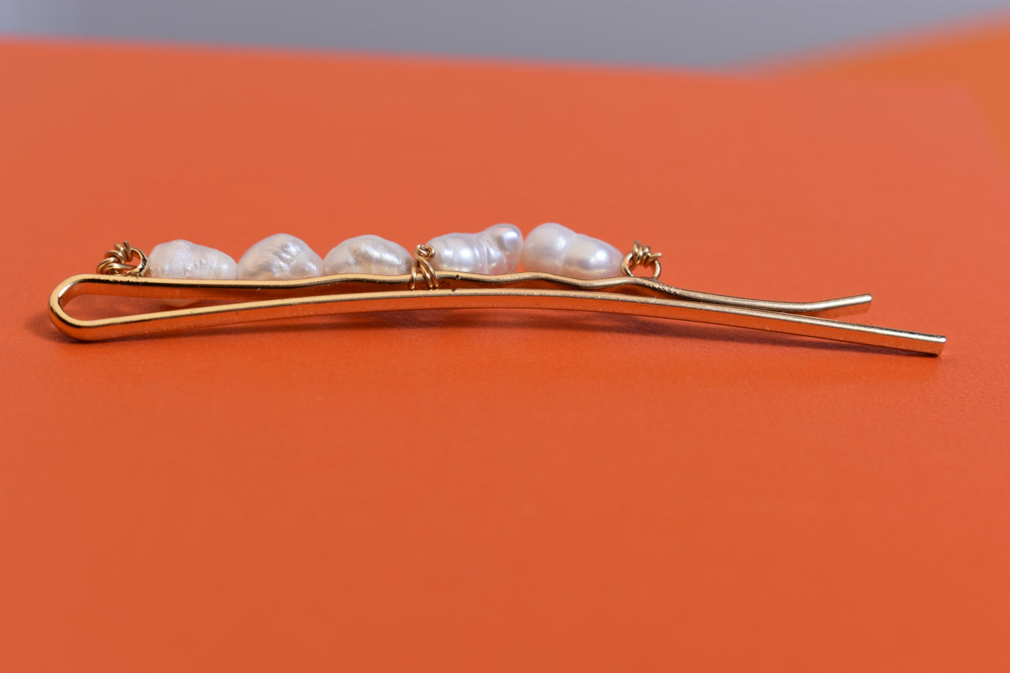 Three sets of natural pearl gold hair clips