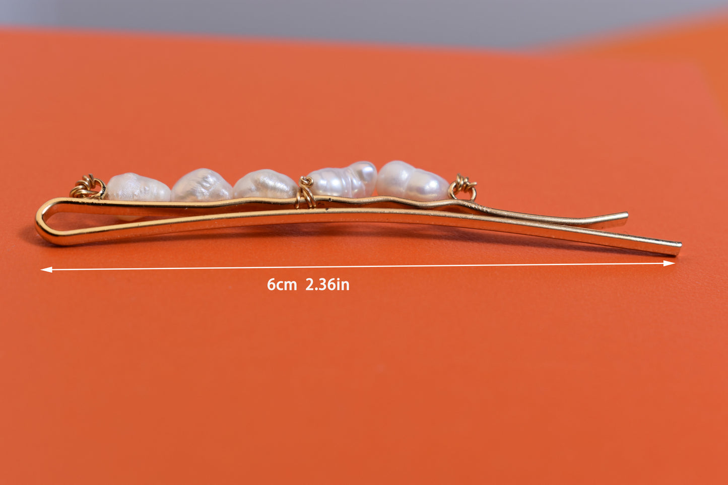 Three sets of natural pearl gold hair clips