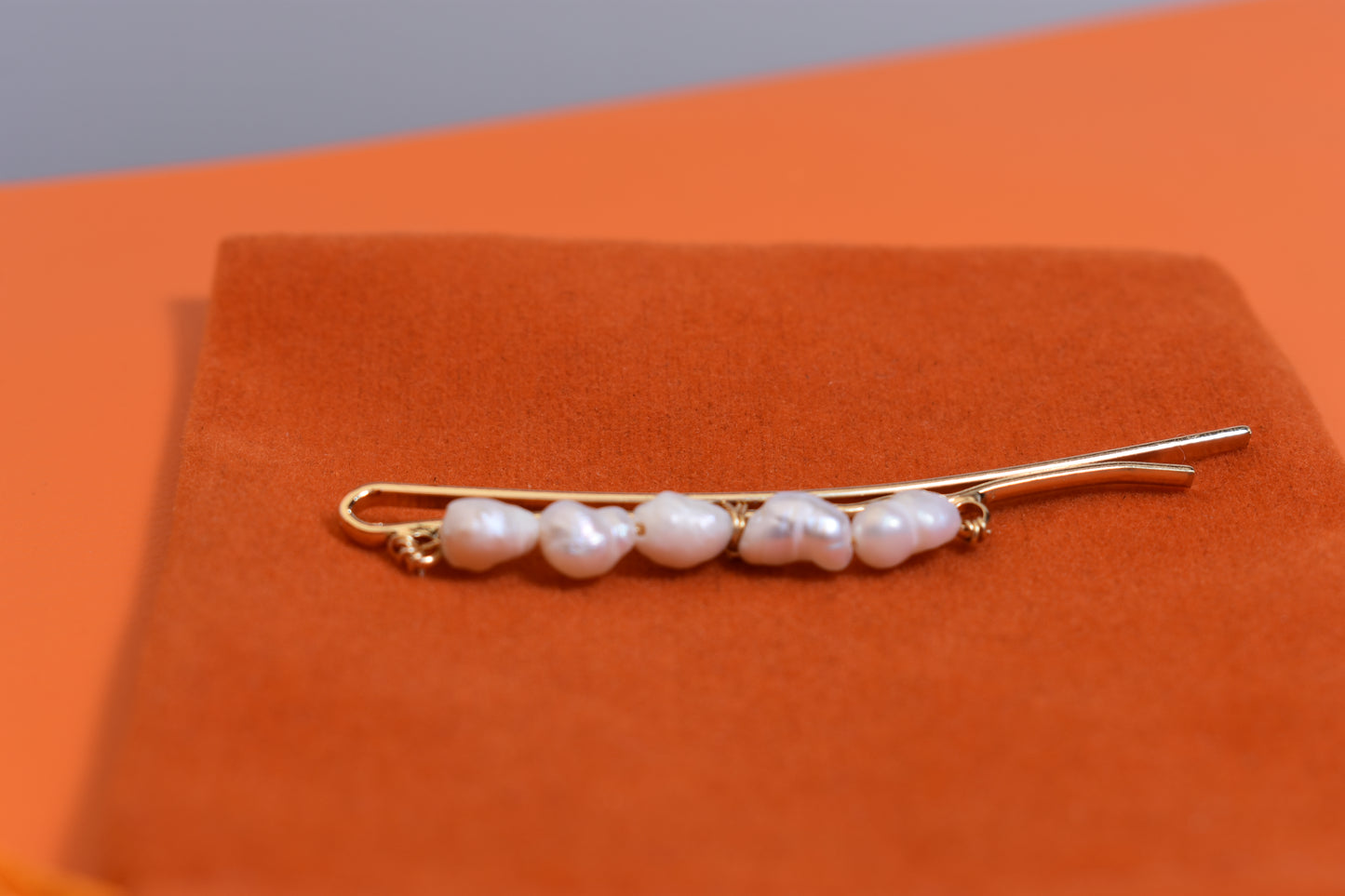 Three sets of natural pearl gold hair clips