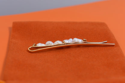 Three sets of natural pearl gold hair clips