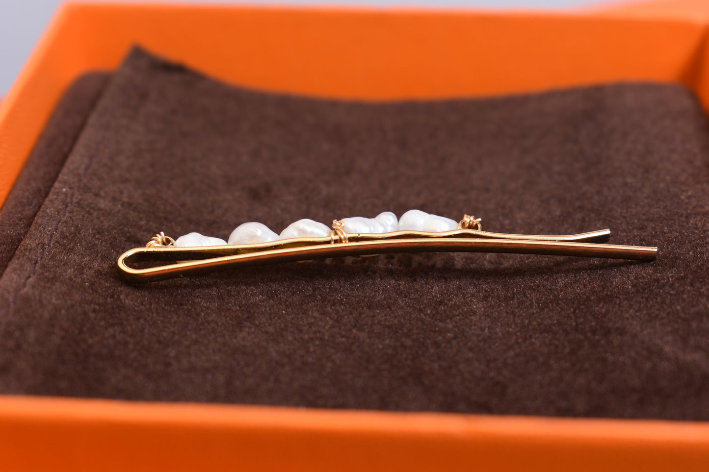 Three sets of natural pearl gold hair clips