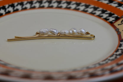 Three sets of natural pearl gold hair clips