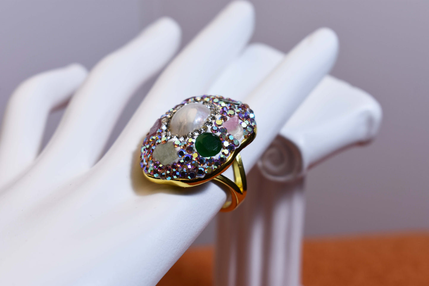 Luxurious shiny natural pearl ring with three-dimensional dense inlay of colored zircon gemstones, adjustable ring at the opening