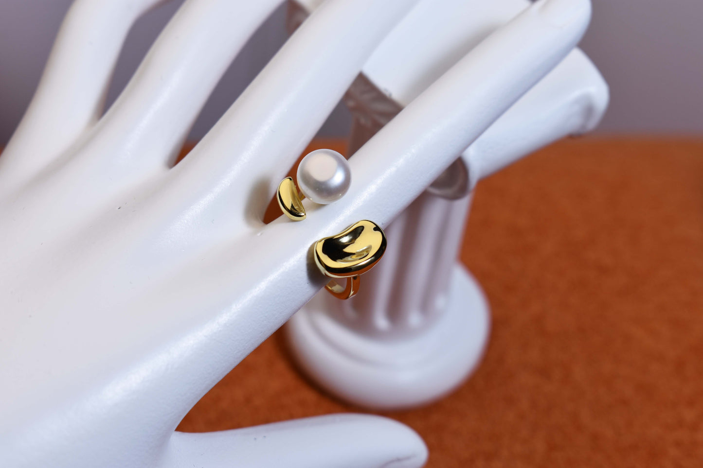 Natural pearl ring with gold size and double petal design with adjustable opening