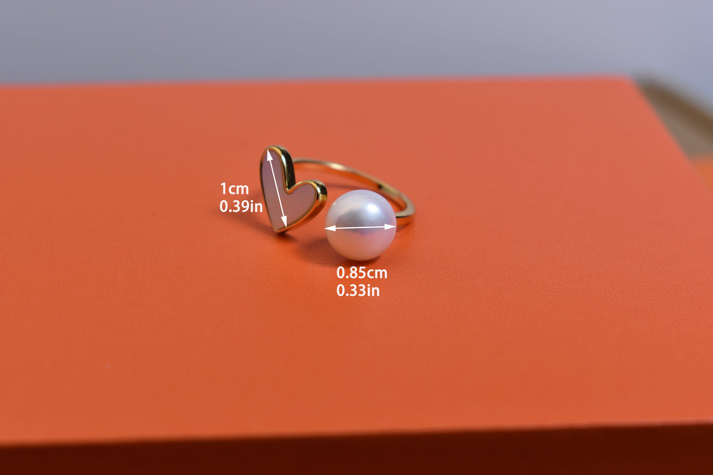 Pearl ring with peach heart and heart-shaped design, inlaid with white shell, adjustable opening