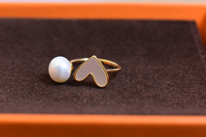 Pearl ring with peach heart and heart-shaped design, inlaid with white shell, adjustable opening