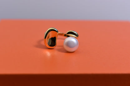 Natural pearl ring with gold size and double petal design with adjustable opening