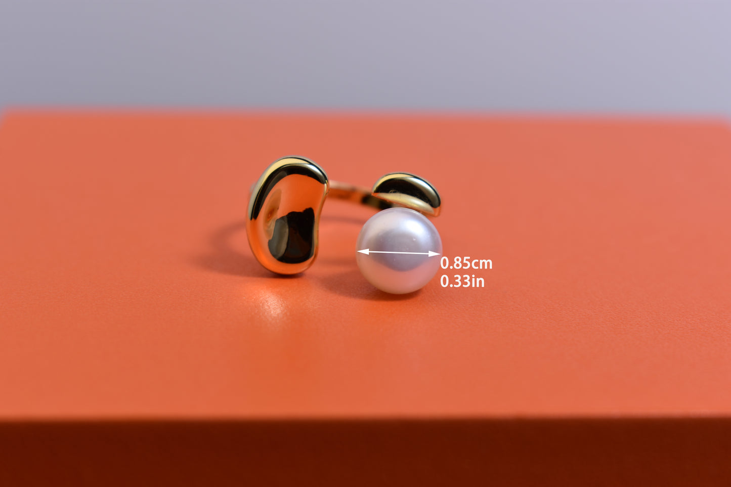 Natural pearl ring with gold size and double petal design with adjustable opening