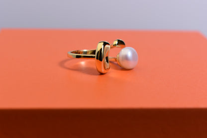 Natural pearl ring with gold size and double petal design with adjustable opening