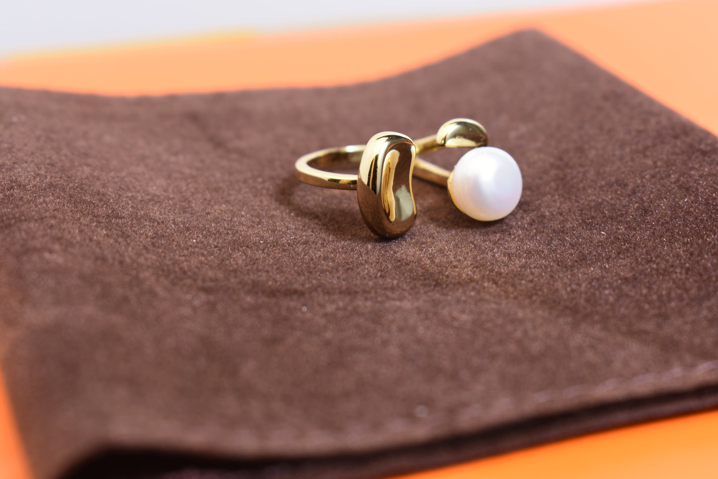 Natural pearl ring with gold size and double petal design with adjustable opening