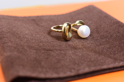 Natural pearl ring with gold size and double petal design with adjustable opening