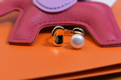 Natural pearl ring with gold size and double petal design with adjustable opening