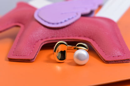 Natural pearl ring with gold size and double petal design with adjustable opening