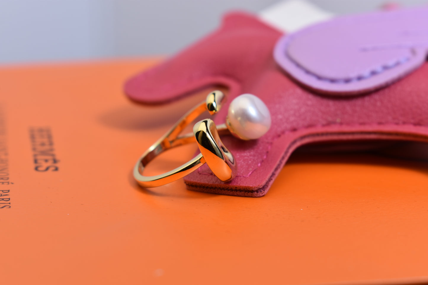 Natural pearl ring with gold size and double petal design with adjustable opening